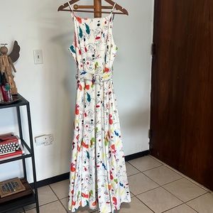 Maxi dress with abstract faces patterns